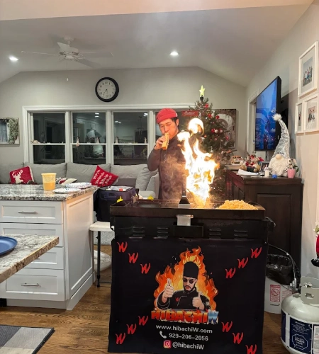 Indoor hibachi at home live fire moment with a private chef in Connecticut