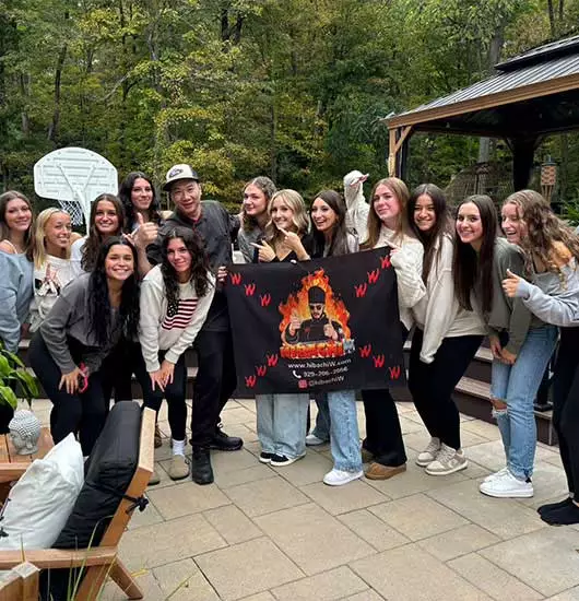 hibachi at home airbnb delaware – girls group photo during backyard dinner